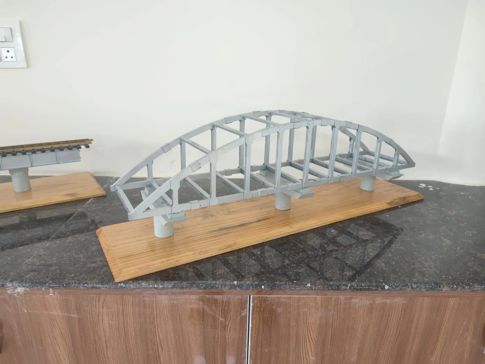 Bowstring bridge miniature on a wooden base