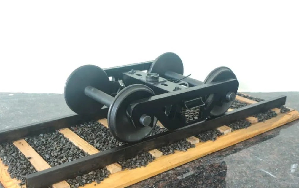 The finished CASNUB bogie miniature, printed in black, on a ballasted track base